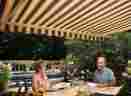 4122 Motorized Opens Sunsetter 12 Retractable Awning In Acrylic Fabric Outdoor Awnings