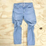 Levi Red Trademark Tab Light Wash Straight Leg Jeans. Fixed Price $24.50.