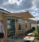 Outsunny Awning Shade Retractable Manual, Beige, 12X10. Fixed Price $350.00.