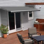 Aleko Motorized Retractable 13 X 10 Ft Patio Awning Grey Sunshade Canopy. Fixed Price $549.00.
