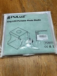 Puluz Portable Photo Studio PU5021 New/sealed 6 Backdrops. Fixed Price $14.00.
